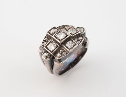 A silver (800) and platinum (850) ring with...