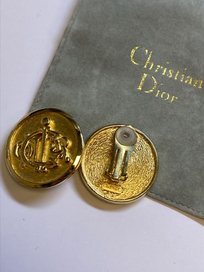 Christian DIOR
Pair of round gilded metal...