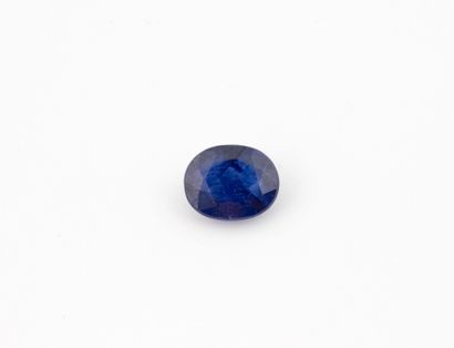 Oval-cut blue sapphire on paper.
Weight:...
