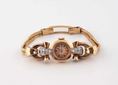 UNIVERSAL GENEVE
Ladies' wristwatch in yellow...