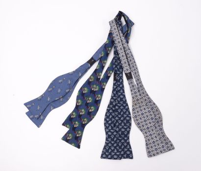 HERMES 
Set of 4 bow ties in blue silk.
Animal,...