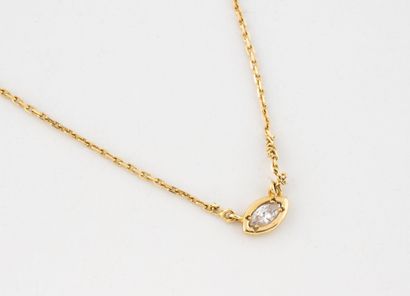 Yellow gold (750) forçat link necklace holding...