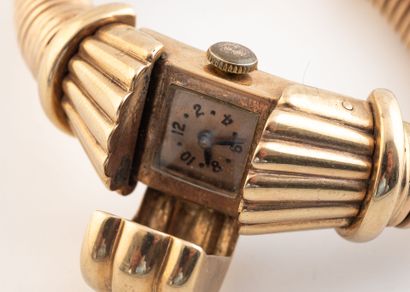 Ladies' tank-type wristwatch in yellow gold...