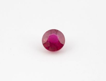 Round ruby on paper.
Weight: 2.04 carats.
Probably...