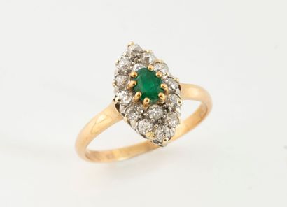 Yellow gold (750) marquise ring centered...