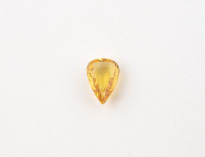Pear-cut yellow sapphire on paper.
Weight:...