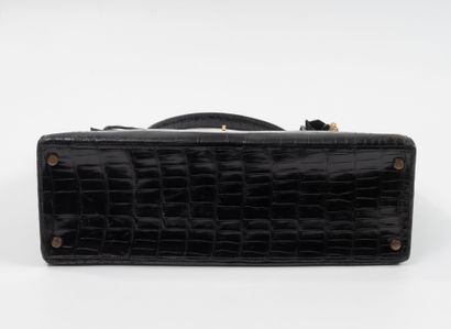 HERMES Paris 
35 cm Kelly bag in black porosus...