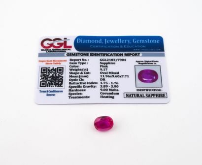 Natural oval-cut pink sapphire on paper.
Very...