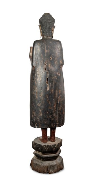 THAILAND
Large standing wooden Buddha, hands...