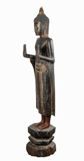 THAILAND
Large standing wooden Buddha, hands...