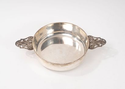 A round silver (950) vegetable dish on a...