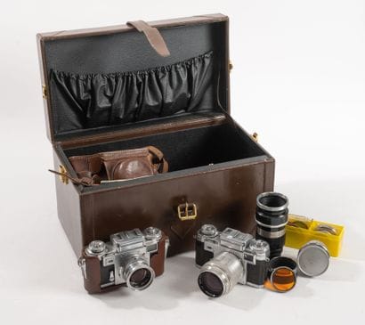 In leather case, set of photographic equipment...
