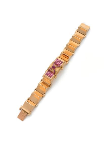 Belle montre bracelet de dame en or jaune...