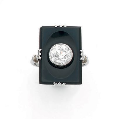 A platinum (950) ring with a rectangular...