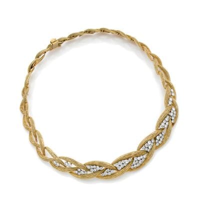 Collier en or jaune (750) et platine (850)...