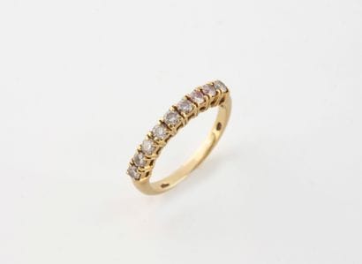 American half wedding band in yellow gold...