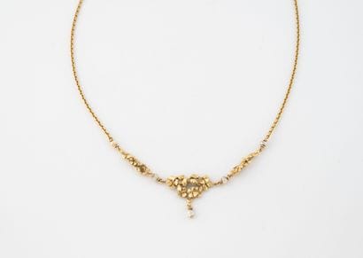 Collier en or jaune (750) à maille forçat...