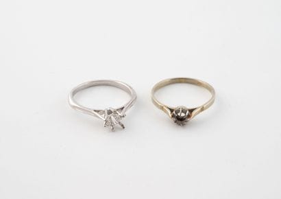 Two solitaire ring settings in white gold...
