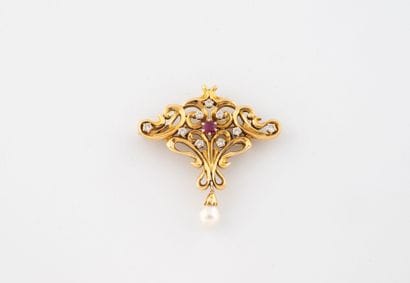 Yellow gold (750) openwork brooch with stylized...