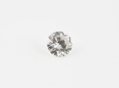 Diamant sur papier de taille brillant.
Poids...