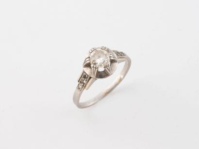Platinum (850) ring set with a claw-set half-cut...