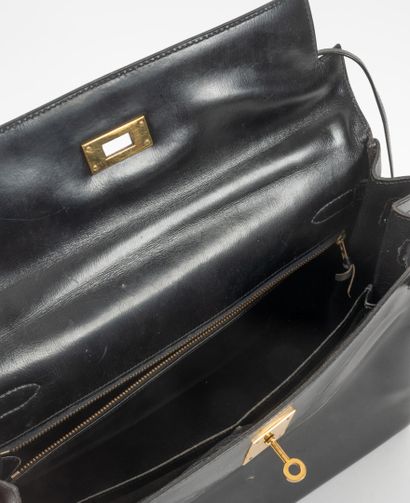 HERMES
32 cm Kelly bag in black box calfskin....