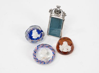 Set of three crystal paperweights containing...