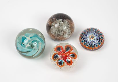 Set of four glass paperweight balls.
Scratches...