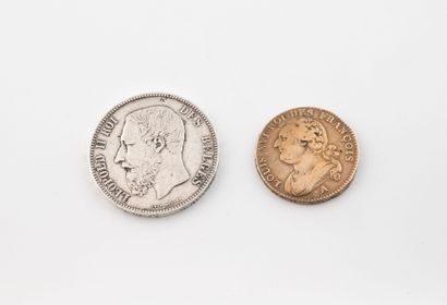 Two coins:
- One of 5 Belgian francs, silver,...
