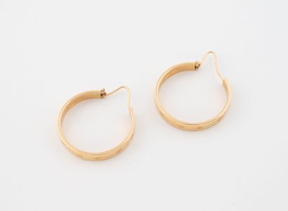 Pair of creole earrings in yellow gold (750),...