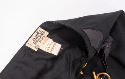HERMES 
Skirt in black wool, adorned with...