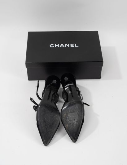CHANEL
- Pair of black leather and velvet...