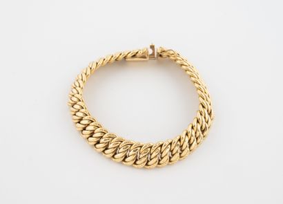 Gourmet bracelet in yellow gold (750).
Ratchet...