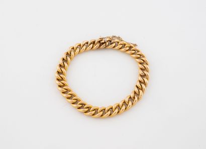 Hollow gold (750) bracelet with striped gourmette...