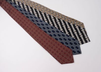 HERMES 
4 printed silk ties with geometric...