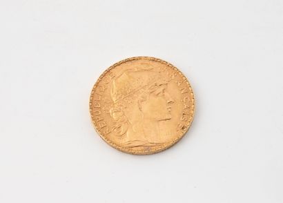 20 franc coin in yellow gold, 1906.
Weight...