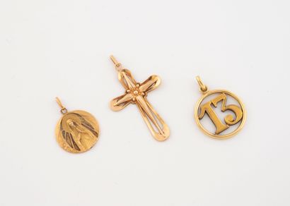 Two religious pendants in yellow gold (750),...