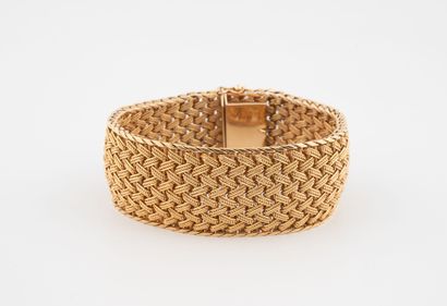 Flexible bracelet in yellow gold (750) with...