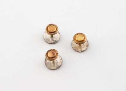 Three breastplate buttons in yellow gold...