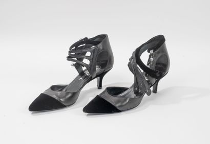 CHANEL
- Pair of black leather and velvet...
