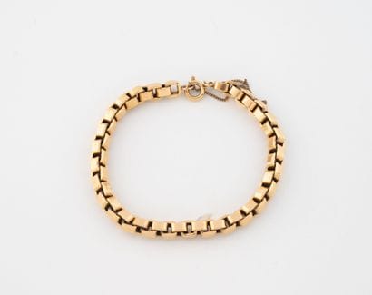 Square-mesh articulated bracelet in yellow...