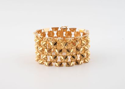 Yellow gold (750) bracelet with fancy supple...