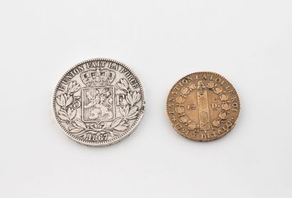 Two coins:
- One of 5 Belgian francs, silver,...