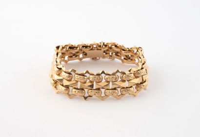 Articulated bracelet in yellow gold (750)...