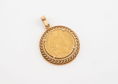 Yellow gold (750) pendant adorned with a...