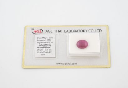 Oval-cut ruby cabochon on paper, under seal.
Sapphire...