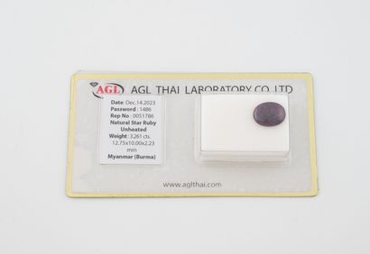 Oval ruby cabochon on paper, under seal.
Weight:...