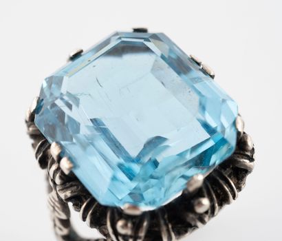 Ring set with a beautiful emerald-cut aquamarine...