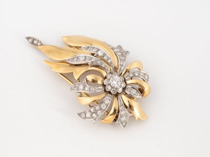 Yellow and white gold (750) lapel clip set...