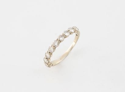 Half-American wedding band in white gold...